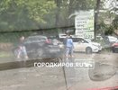 Мощный ливень заставил кировчан ходить босиком. Репортаж